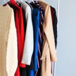Stylish Outerwear - Assorted-colored Dresses on White Clothes Rack