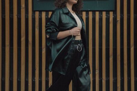 Fashion Trends - Young Woman in Fashion Trends Posing on a Wall Signage