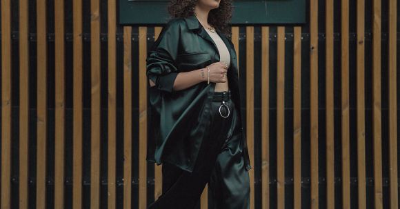 Fashion Trends - Young Woman in Fashion Trends Posing on a Wall Signage